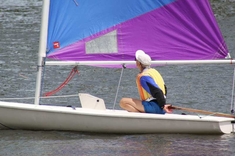 Boat with colorful sail