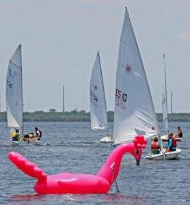 Three sailboats racing