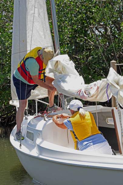 Couple rigging boat