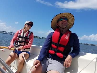 Man and woman sailing