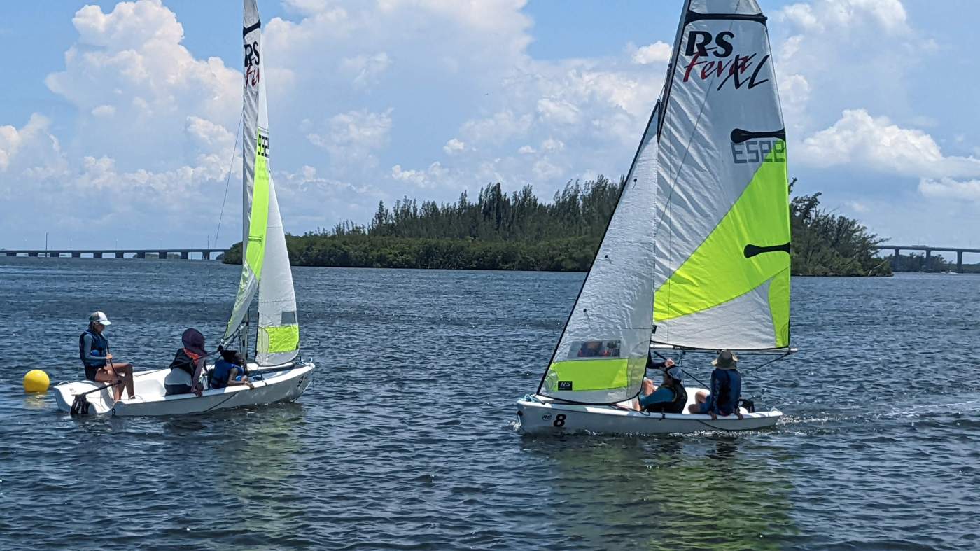 Two sailboats out for a sail