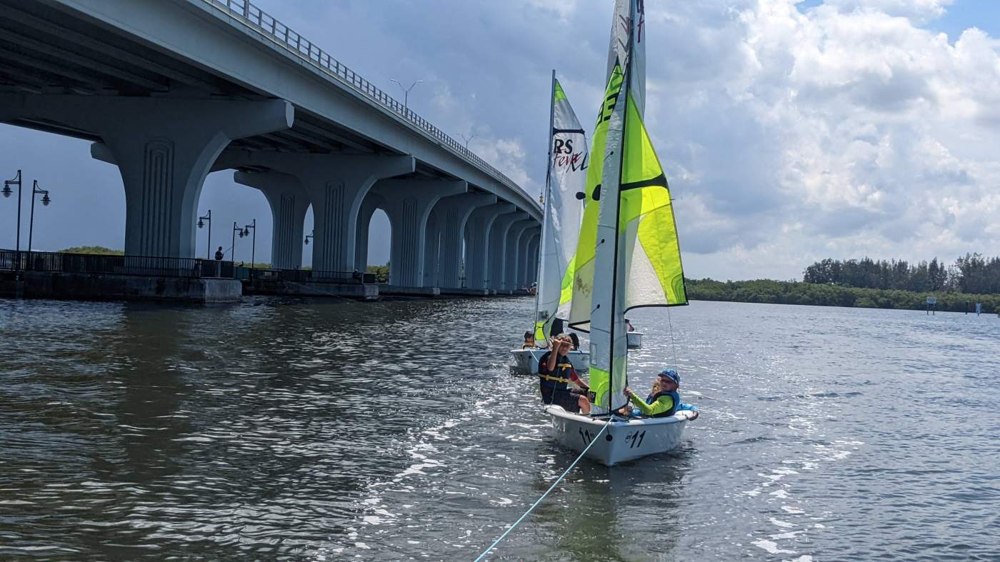 A sailboat near a bridge