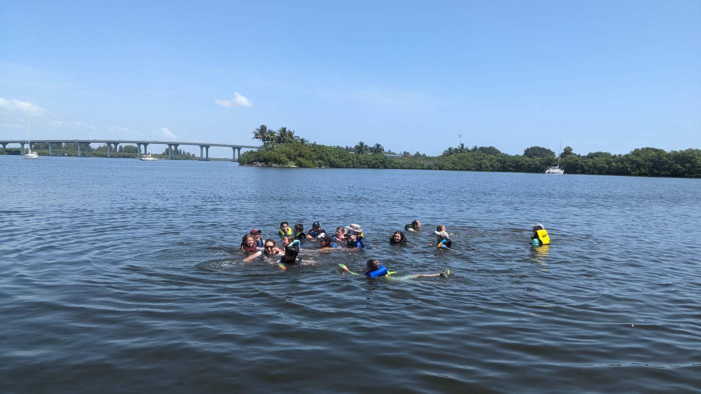 Children swimming in the lagoon