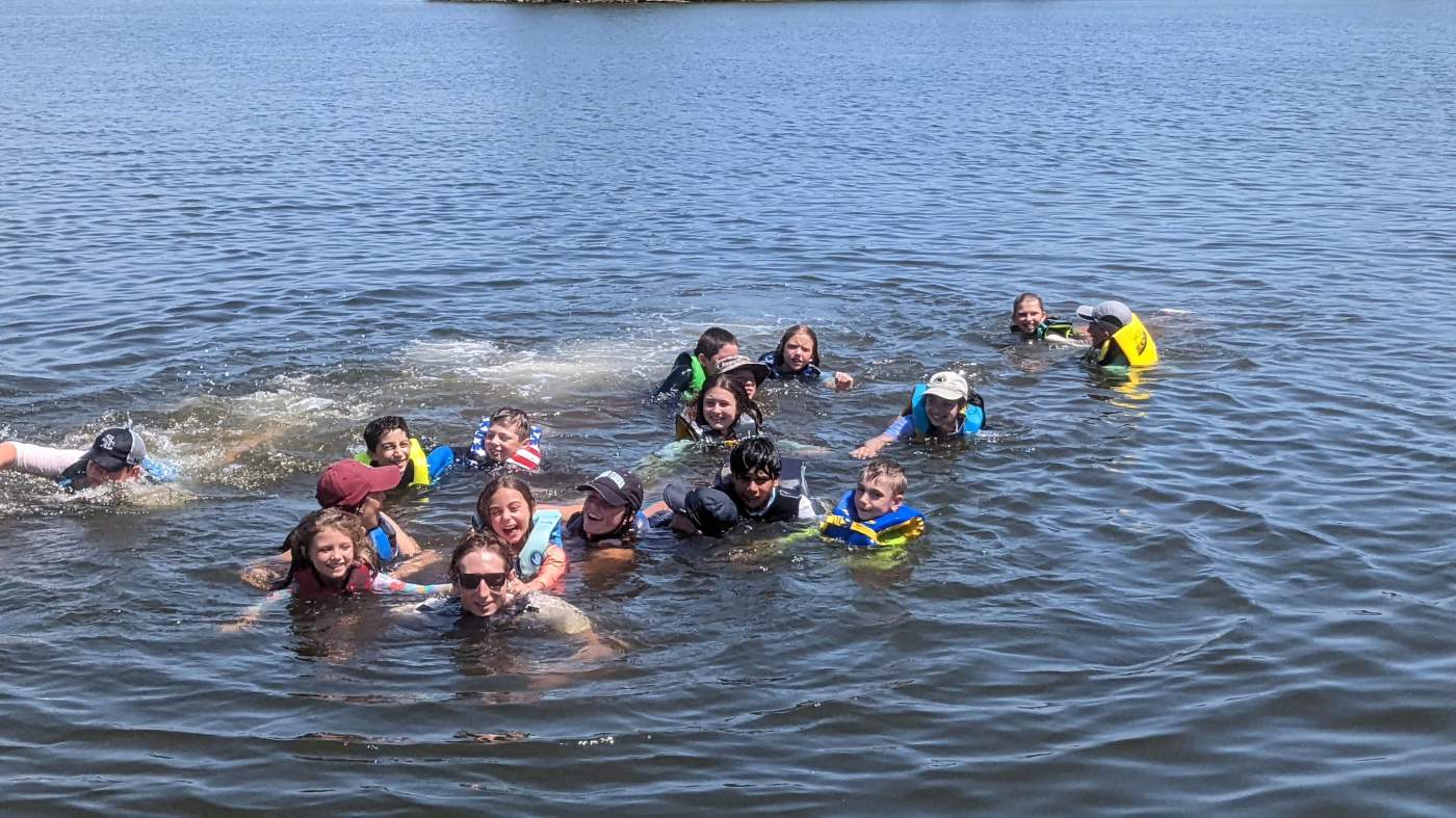 Children swimming in the lagoon