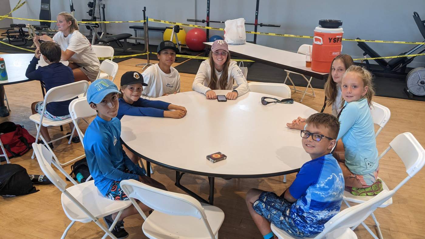 Children seated around a table