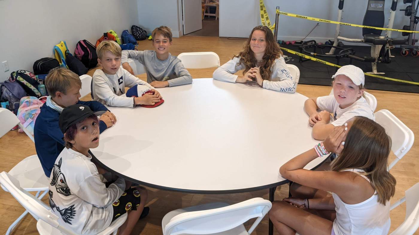 Children seated around a table