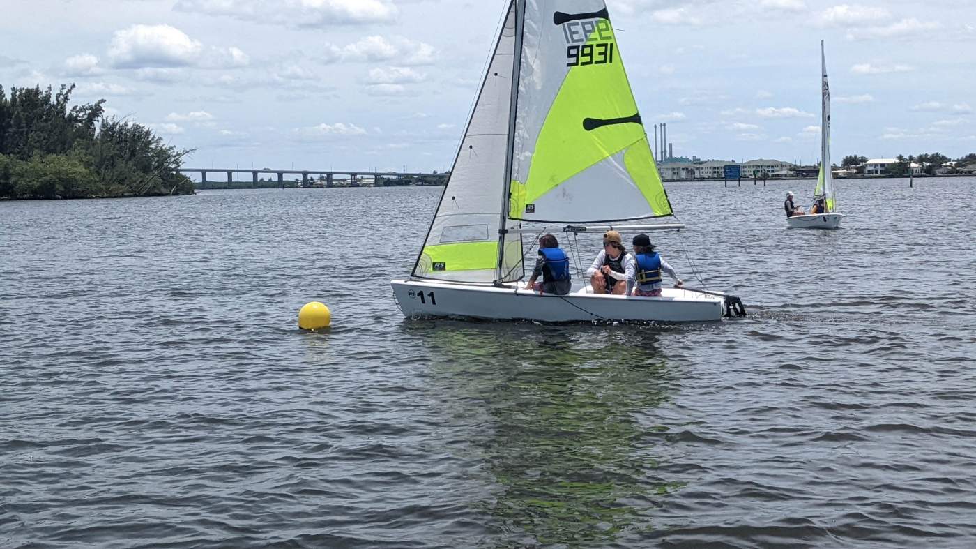 Sailboat rounding a buoy