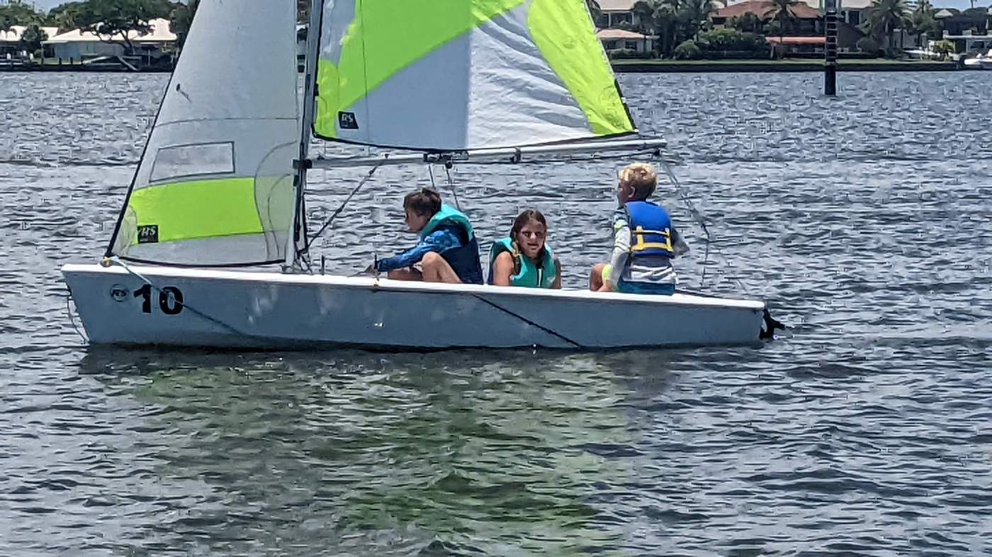 Children sailing a boat