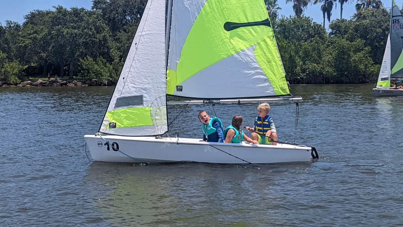 Children sailing a boat