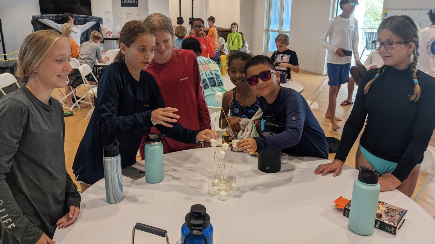 A group of children around a table