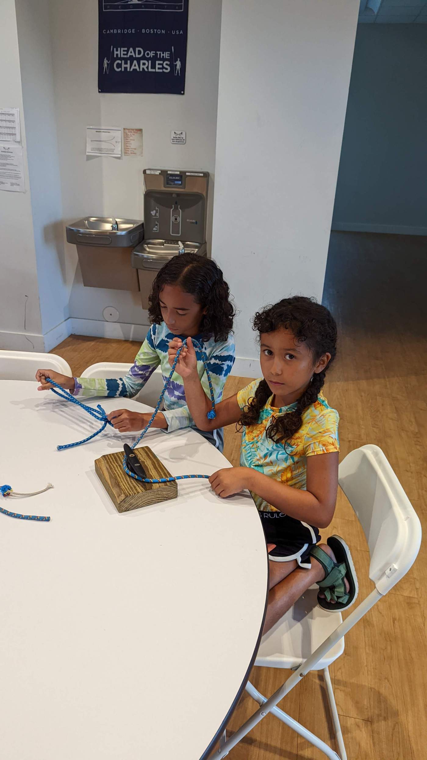 Two girls seated at a table