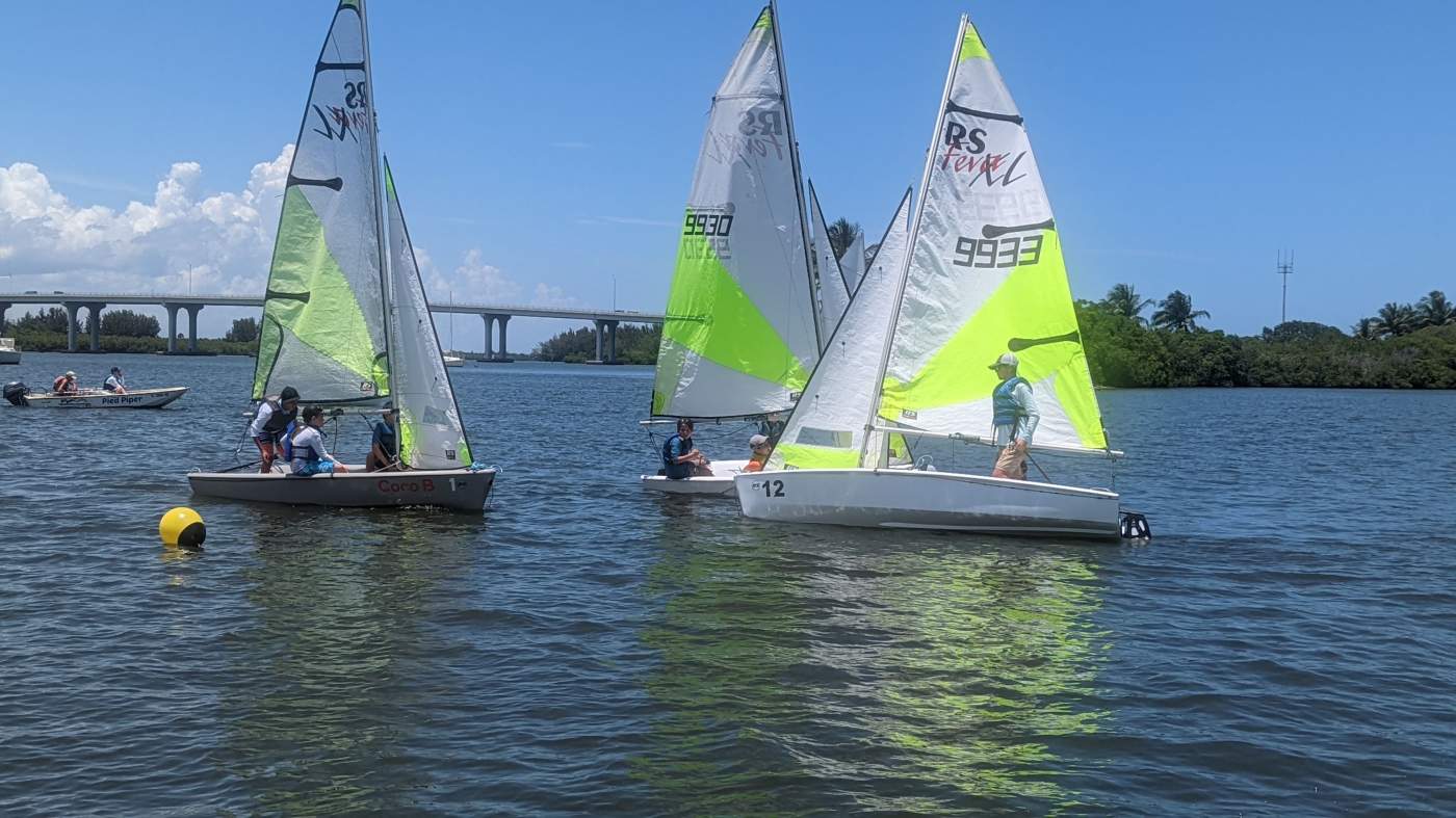 Three sailboats out on the lagoon