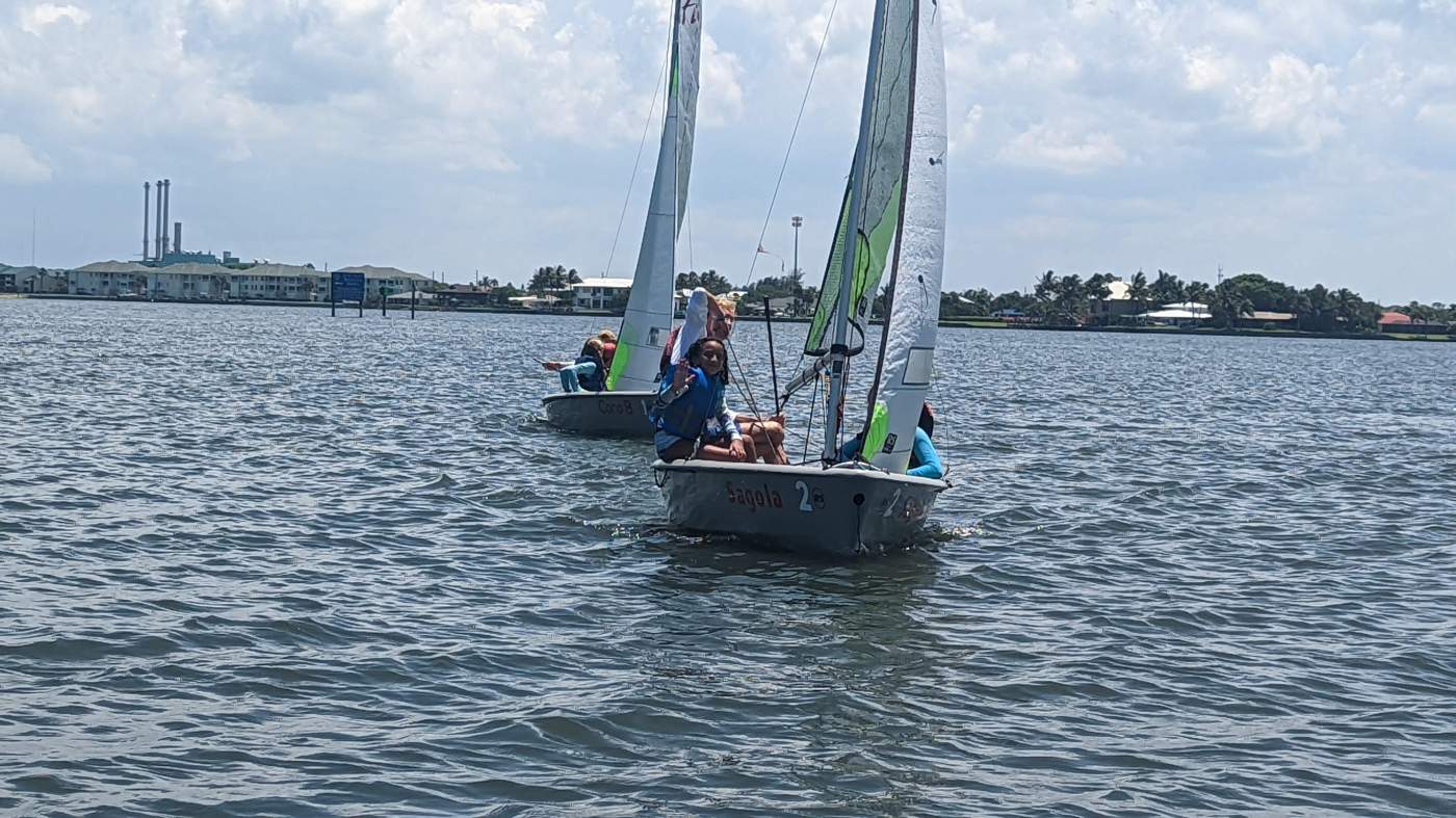 Children sailing a boat