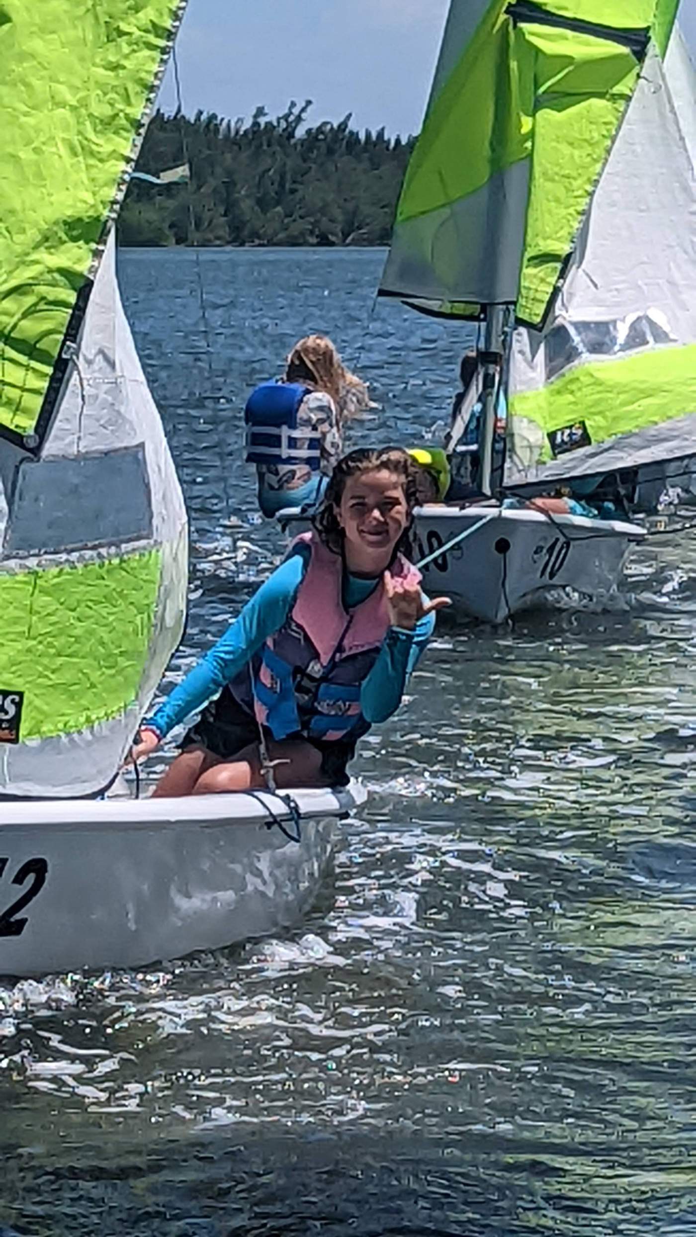  Agirl sailing a boat