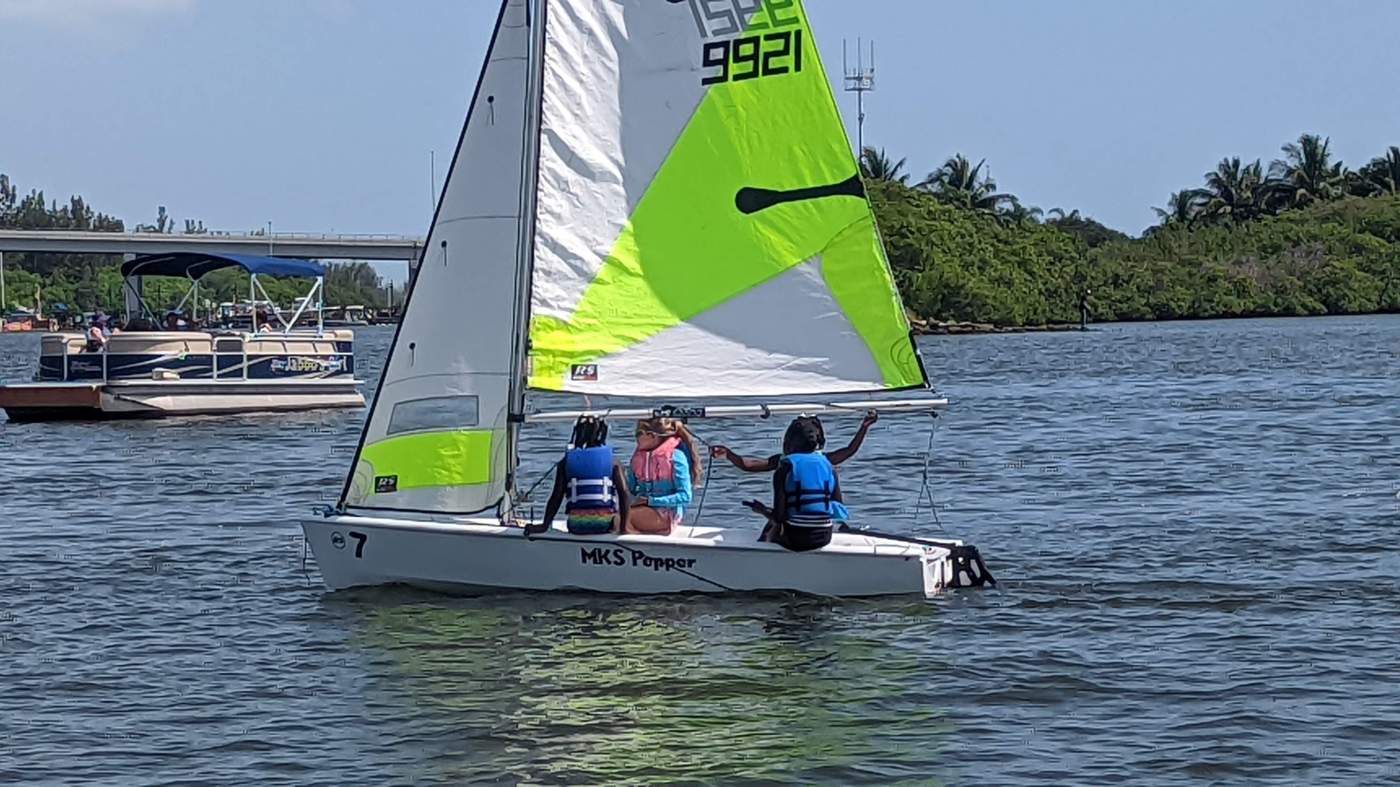 Children sailing a boat