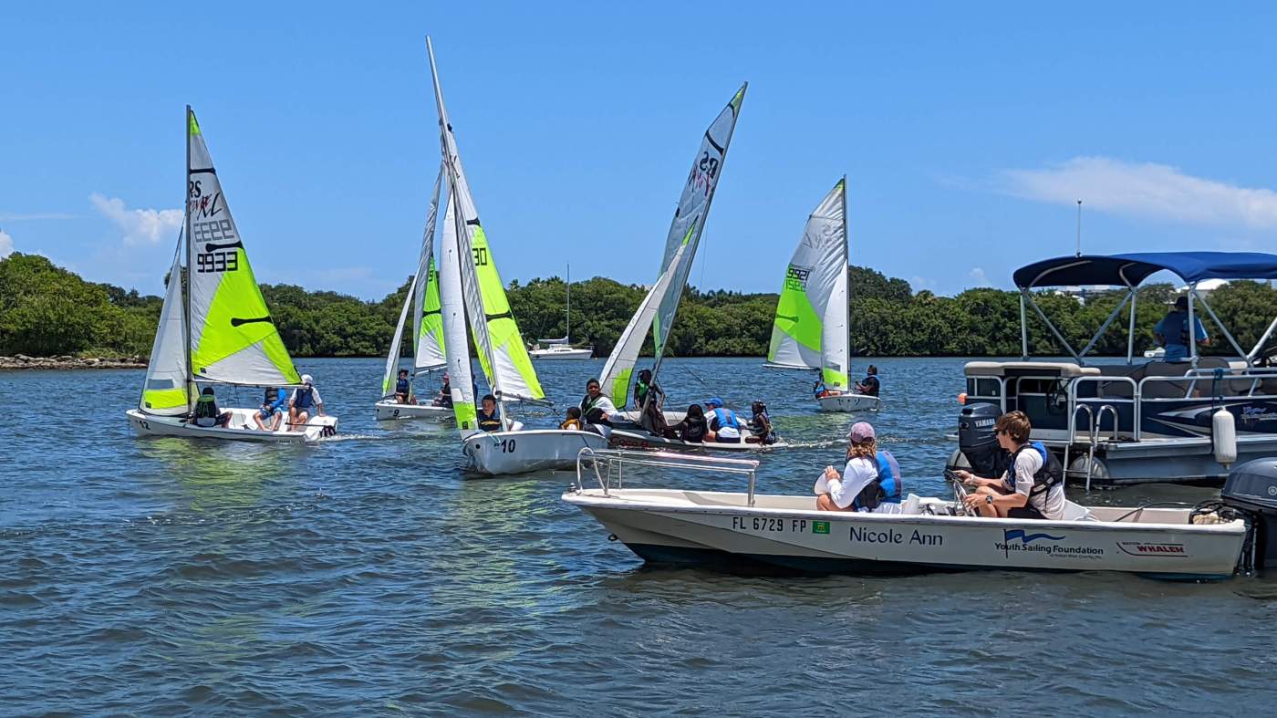 Sailboats and a powerboat out on the lagoon